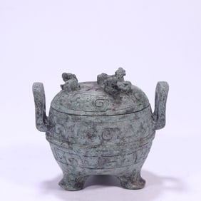 A bronze three-legged lid furnace