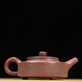 A  piece of Yang Pengnian's purple sand carved poetry teapot