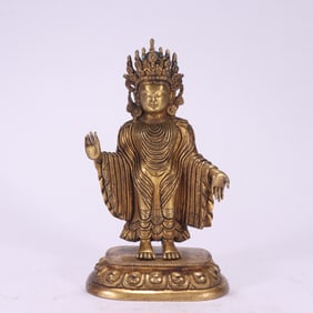 A piece of Qing Dynasty bronze gilt sandalwood Buddha