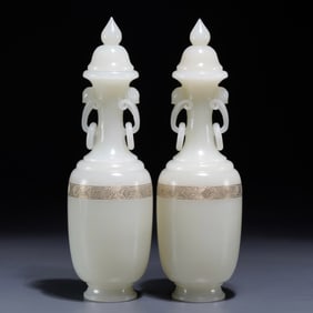 A pair  of Hetian jade ruyi ear bottles