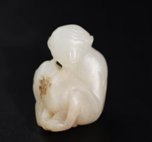 A piece of clear seed jade monkey