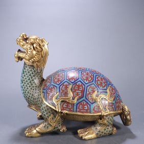 A Qing Dynasty bronze gilt cloisonne dragon turtle ornament