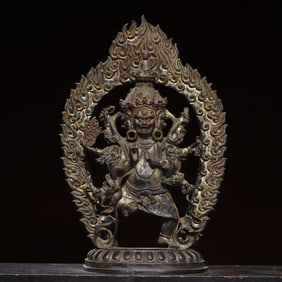 A bronze gold six-armed clam gala statue