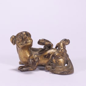 A Qing Dynasty bronze lacquer gold ornament