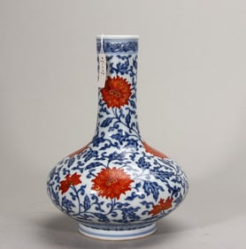 A piece of Qing Yongzheng blue and white alum red entwined branch lotus pattern water chestnut