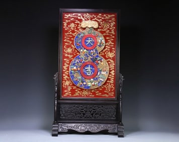 A piece of Qing Dynasty red sandalwood lapis lazuli inlaid gourd Daji interstitial