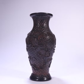 A Qing Dynasty glazed carved dragon pattern appreciation bottle