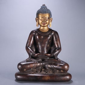 A piece of Qing Dynasty purple gold copper inlaid with silver Sakyamuni