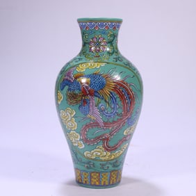 A piece of turquoise green tire painted dragon pattern bottle