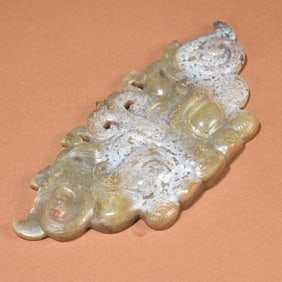 A piece  of Han Dynasty Hetian jade beast face high ancient jade