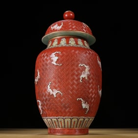 A piece  of Qing Dynasty coral glazed carved porcelain bat pattern lantern jar