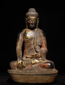 A bluestone painted Buddha statue from the Ming Dynasty
