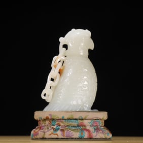 A Qing Dynasty Hetian jade seed material antique bird ornament