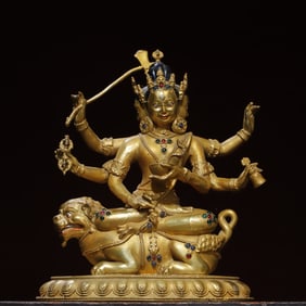 A bronze gilt jeweled Buddha statue