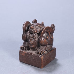 A piece of Qing Dynasty agarwood beast button chapter material