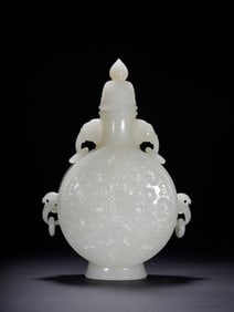 A piece of Hetian jade treasure flower elephant ear vase