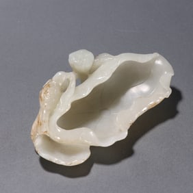 A piece of Qing Dynasty Hetian jade seed material lotus leaf-shaped study pen wash