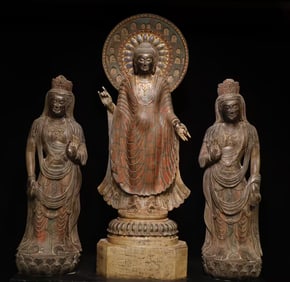 A set of bluestone painted Western Three Holy Buddha statues in the Tang Dynasty