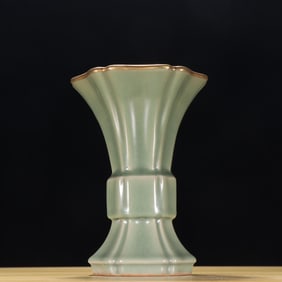 A piece of Longquan celadon with gold flowers