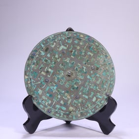 A piece of turquoise glazed bronze mirror