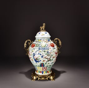 A Ming Jiajing multicolored inlaid copper gilt dragon and phoenix pattern lid jar