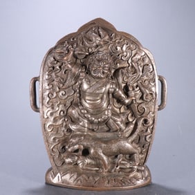 A Qing Dynasty bronze silver-plated Dharma Protector plaque