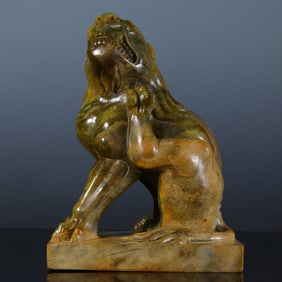 A piece of ancient jade lion ornament