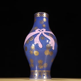 A Qing Dynasty blue glazed gold ball flower wrapper vase