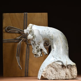 A piece of ancient jade horse head ornament