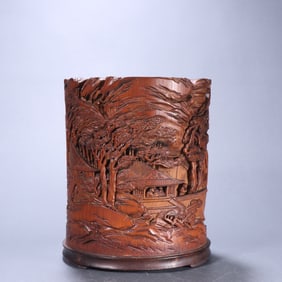 A  piece of its auspicious bamboo carved mountain stone figure pen holder