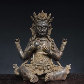 A bronze statue of a clam gala