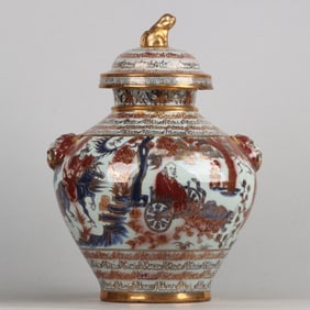 A pair of blue and white glazed red gilt Guigu under the mountain pattern beast ear dog head jar