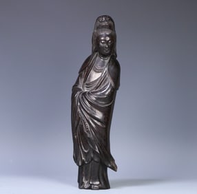 A late Qing rosewood standing Guanyin statue