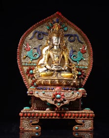 A piece of copper gilt filigree inlaid with gemstones Longevity Buddha