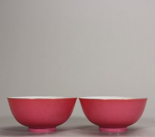 A pair  of small bowls with carmine glaze