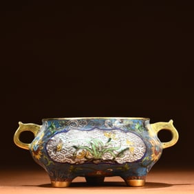 A Qing Dynasty "Qianlong Year" copper cloisonne enamel color double dragon ear three-legged furnace