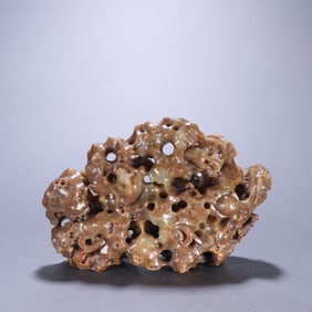 A piece of Qing Dynasty Hetian jade seed material carved Taihu Shishanzi ornaments