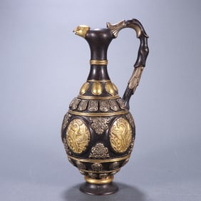 A Qing Dynasty bronze gilt silver holding pot