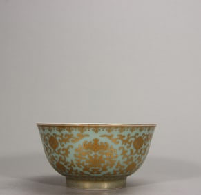 A piece of Qingdao light bean green glaze depicting gold treasure phase pattern bowl