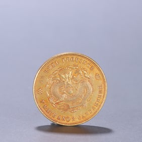 One silver-gilt coin