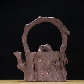 A  piece of Chen Mingyuan's purple sand stump-shaped handle pot