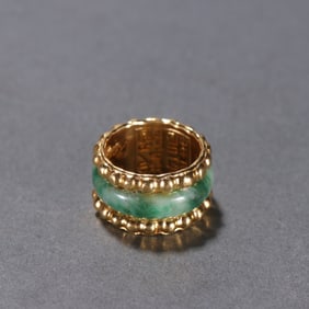 A Qing dynasty gold-encrusted jadeite ring