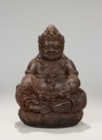 A piece of Qing agarwood carved yellow God of Wealth ornament