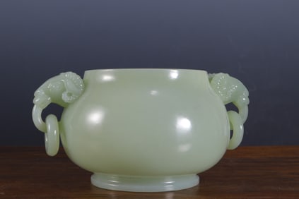 A piece of Hetian jade sheep head round foot furnace