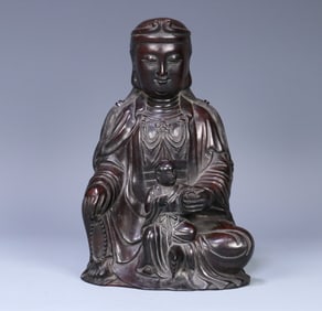 A Qing Dynasty rosewood Guanyin ornament