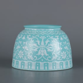 A piece of Qing Qianlong year turquoise green pile white entwined lotus horseshoe wash