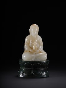 A seated statue of Hetian Jade Amitayus Buddha