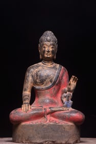 A Great Wei bluestone painted statue of the Buddha