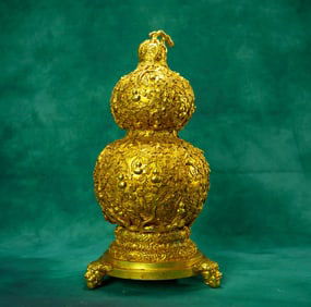 A piece  of copper gilt: a gourd ornament for generations of descendants