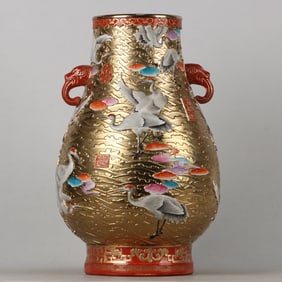 A piece of enamel gilt relief crane pattern elephant ear